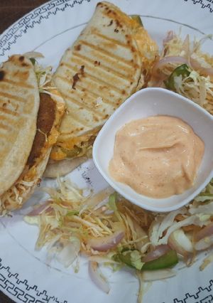 A picture of Chatpata naan with aloo tikki wrap.