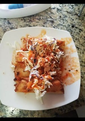 Una foto de Tacos dorados de papa con pollo