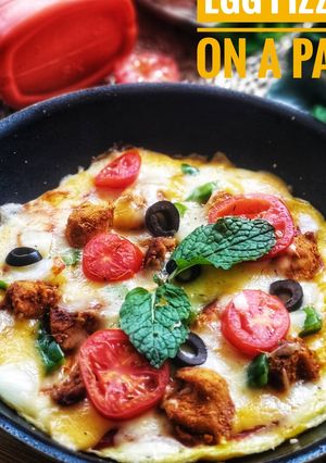 A picture of Egg pizza on a pan.