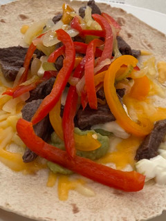 Una foto de Fajitas de carne con pimientos