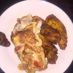 A picture of Plantain with fried egg.
