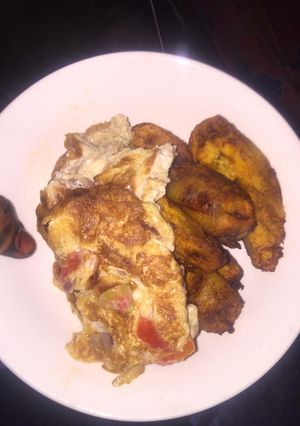 A picture of Plantain with fried egg.