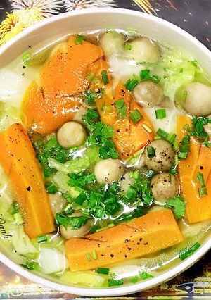 A picture of Vegetarian Napa Cabbage Soup with Straw Mushrooms.