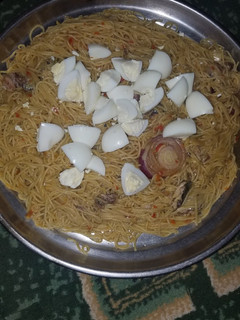 A picture of Taliya da kifi da kwai.