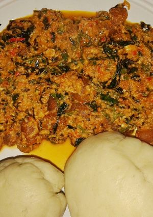 A picture of Semo with Egusi soup.