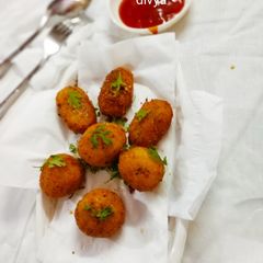 A picture of Cheesy Arancini(eggless).