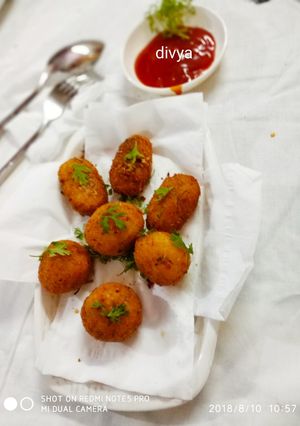 A picture of Cheesy Arancini(eggless).