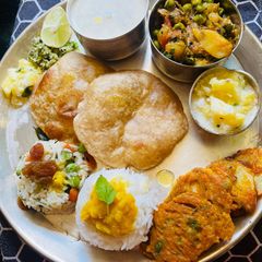 A picture of Dashera Special Neivedhya bhog thali.