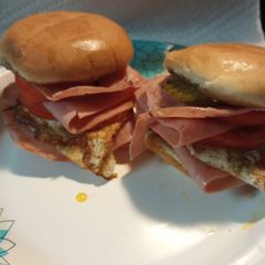 A picture of Ham Egg and Tomato Sandwiches.