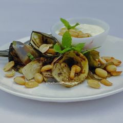 A picture of Pan-grilled Eggplant with pine nuts & garlic.