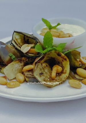 A picture of Pan-grilled Eggplant with pine nuts & garlic.