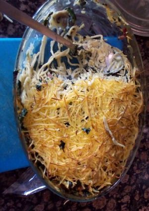 Una foto de Pasta con bechamel, espinacas y champiñones