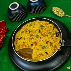 A picture of Paushtik Khichdi / Moong Sprouts Daliya Veggie Khichdi /Protein Packed Khichdi For Lunch.