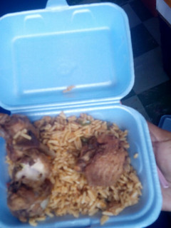 A picture of Nigerian Jollof rice and Fried Turkey.