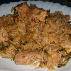 A picture of Rice and boneless chicken.