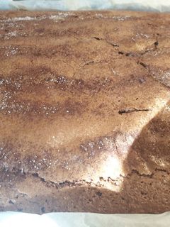 Una foto de Coca de llanda de chocolate y jengibre con canela