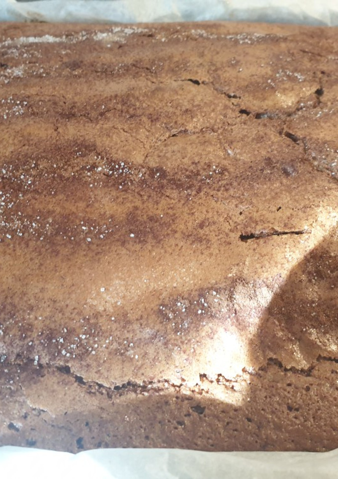 Una foto de Coca de llanda de chocolate y jengibre con canela