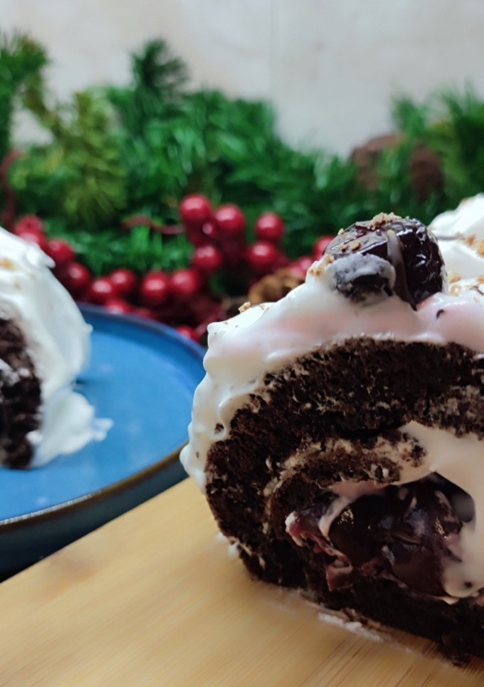 Una foto de Tronco de Navidad con cerezas borrachas
