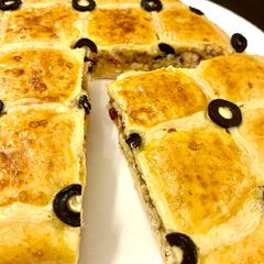 A picture of Focaccia with stuffed chicken.