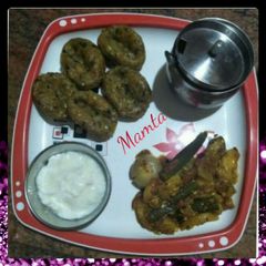 A picture of Muthiya (wheat flour)with Masala veggies.