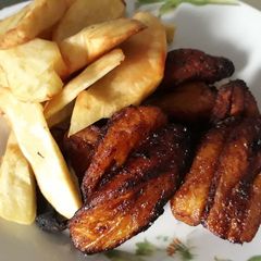 Fried fresh Potatoes and ripe plantain A picture of Fried fresh Potatoes and ripe plantain.