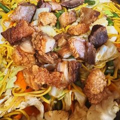 A picture of Pancit Canton w/Crispy Pork Belly.
