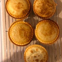A picture of Chicken and mushroom pies.
