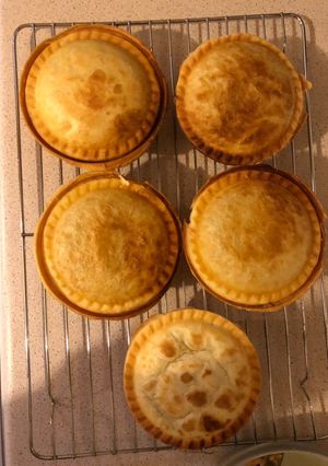 A picture of Chicken and mushroom pies.
