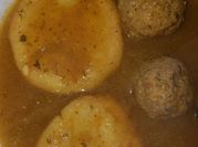 Una foto de sopa de migas