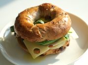 A picture of bread butter and bagels