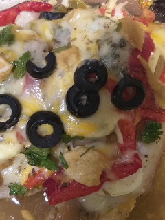 Una foto de Lomo a la pizza