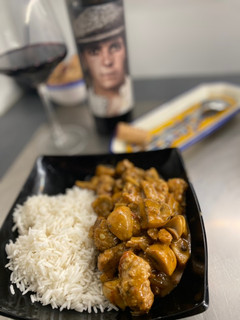 Una foto de Curry de cerdo y portobello