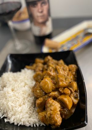 Una foto de Curry de cerdo y portobello
