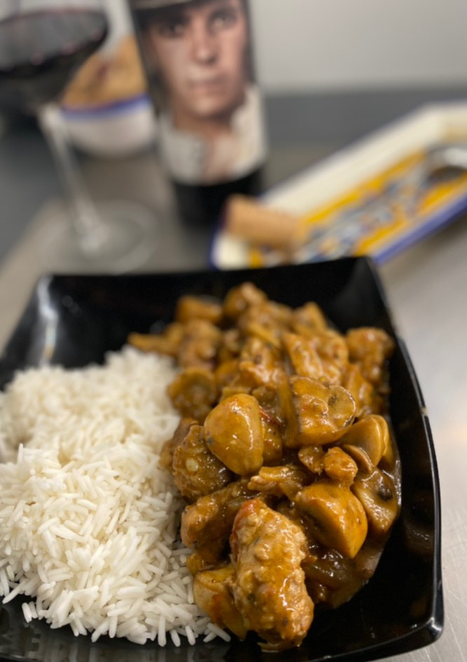 Una foto de Curry de cerdo y portobello