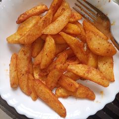 A picture of Pan Roast Potato Wedges.
