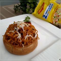 "Schezwan Maggi with Baked Bread Bowl" A picture of "Schezwan Maggi with Baked Bread Bowl".