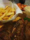 Mushroom sauce served with steak & chips