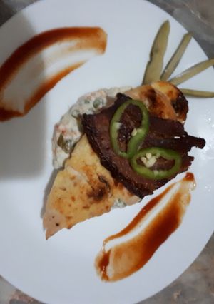 Hasselback csirkemell szalonna ágyon recept fotója