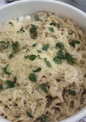 Una foto de Tallarines con “fonduta” de parmigiano y tartufo
