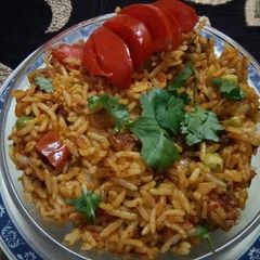 A picture of Tomato Pulao.