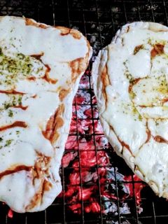 Una foto de Pizza a la Parrilla 🍕😉👌🎉