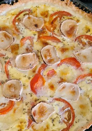 Une photo de Tarte tomate, jambon, mozzarella et chèvre