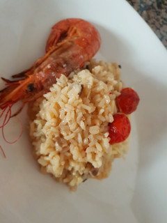 Una foto de Risotto de setas y gambones