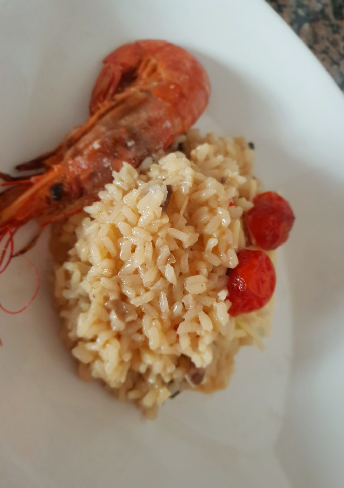Una foto de Risotto de setas y gambones