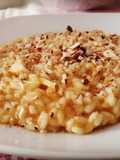 Risotto ai cachi, cacio ricotta e mandorle