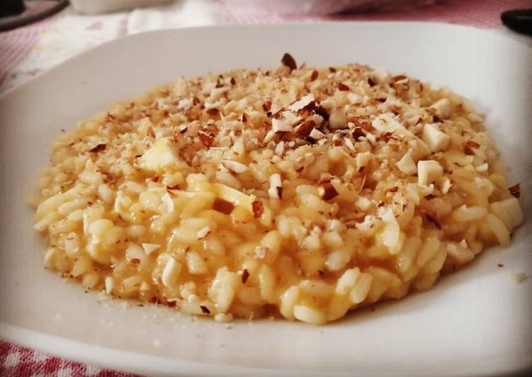 Ricetta Risotto ai cachi, cacio ricotta e mandorle di ...