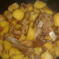 A picture of Wet fry pork/potatoes.