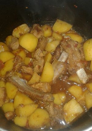 A picture of Wet fry pork/potatoes.