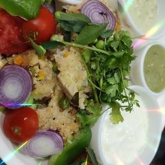 A picture of Jowar vegetable upma rava coconut chutney.