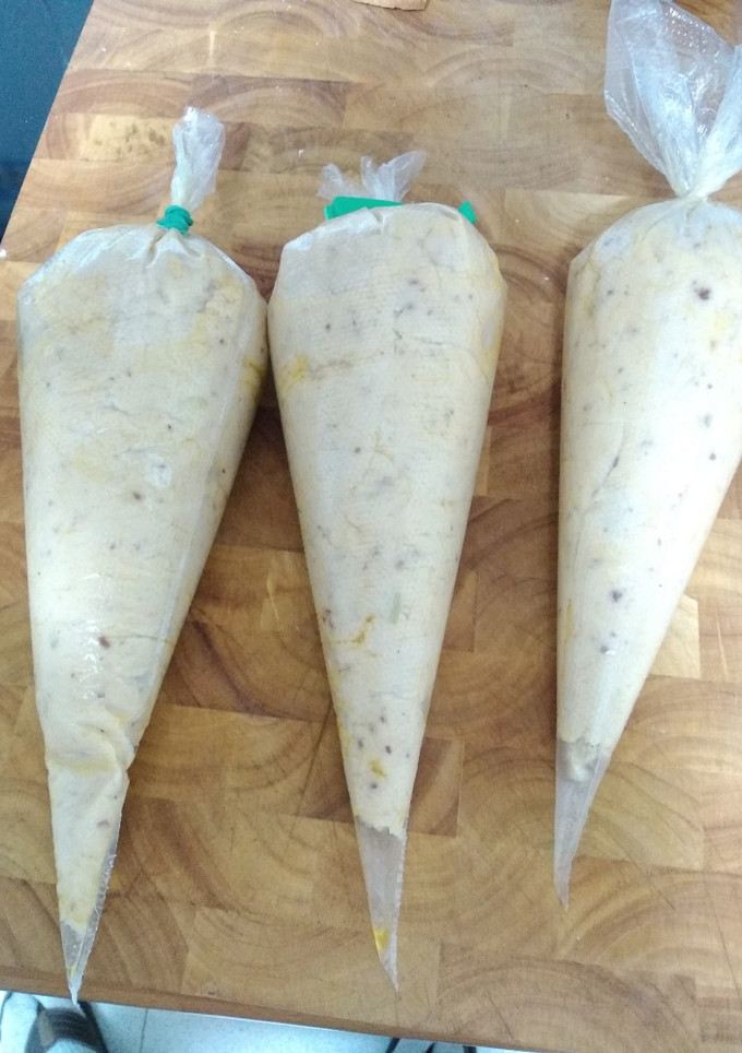 Una foto de Croquetas de pollo, jamón y queso viejo